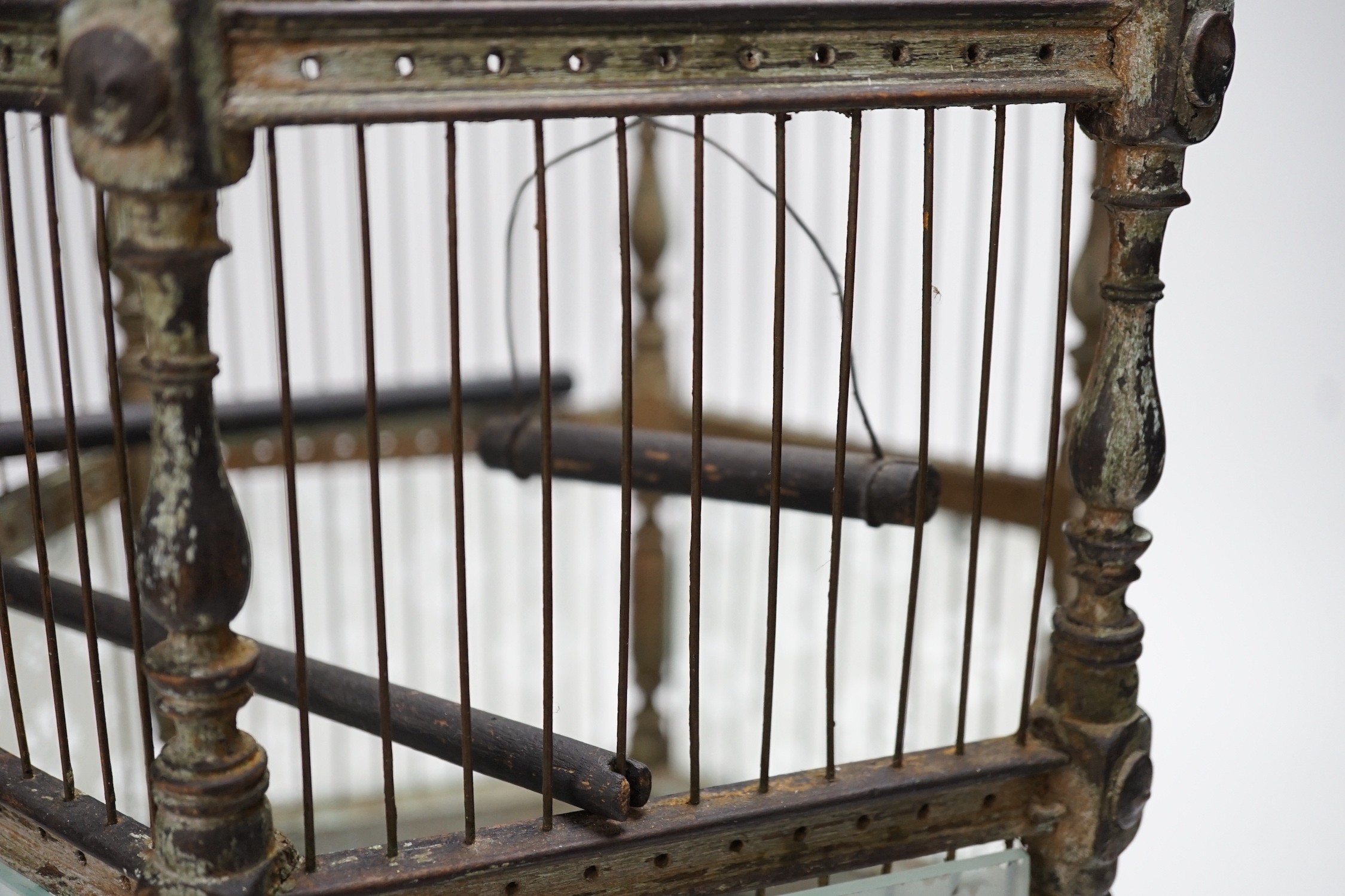 A Victorian brass and glass bird cage. 59cm tall